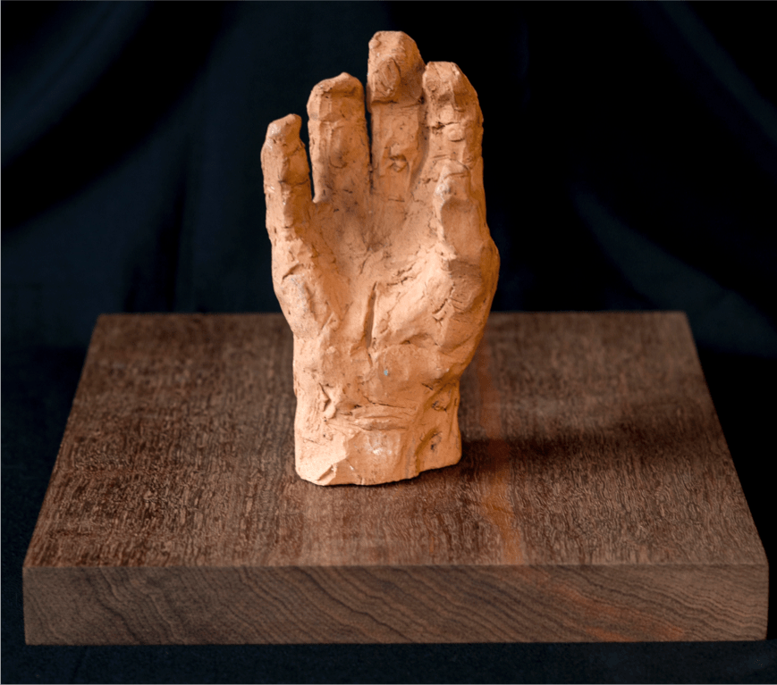 'Hand' terracotta on a jarrah base